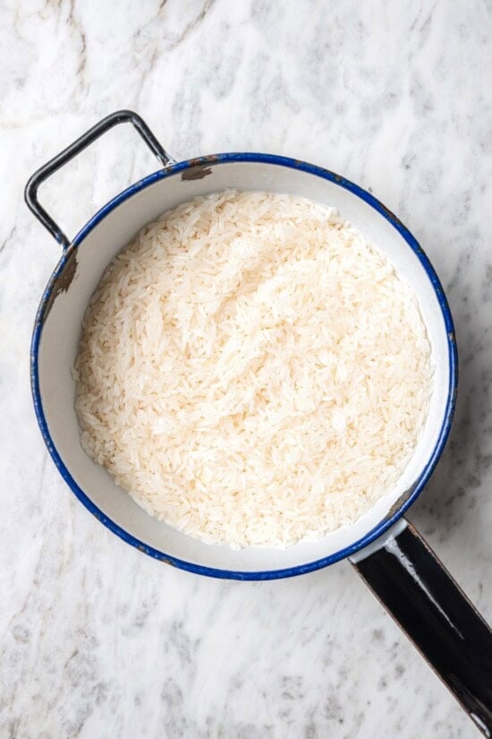 Rinsed rice in pan