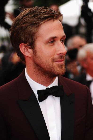 Ryan Gosling in a burgundy tuxedo