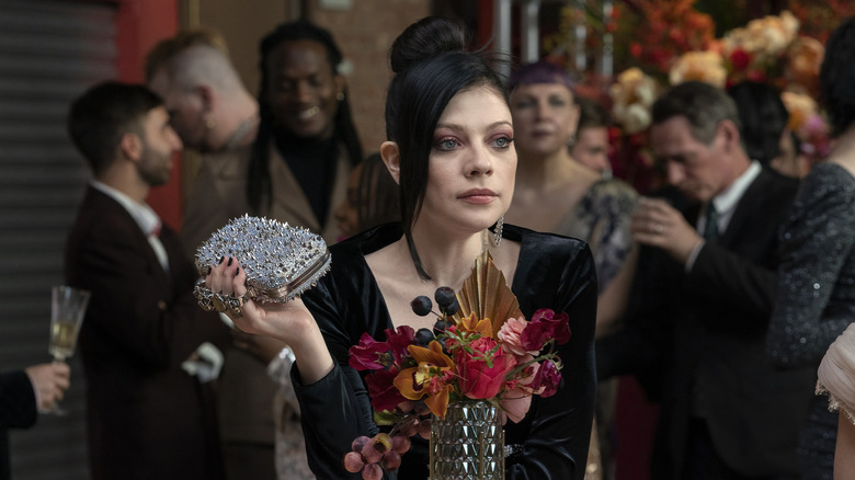 Georgina in a black velvet dress at an event on the Gossip Girl reboot