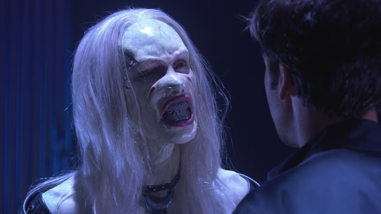 The Queen confronting John Sheppard in Stargate Atlantis