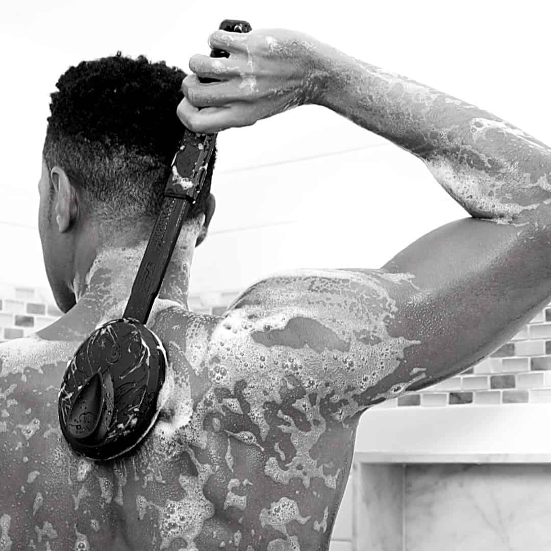 man using the black wolf sonic scrubber