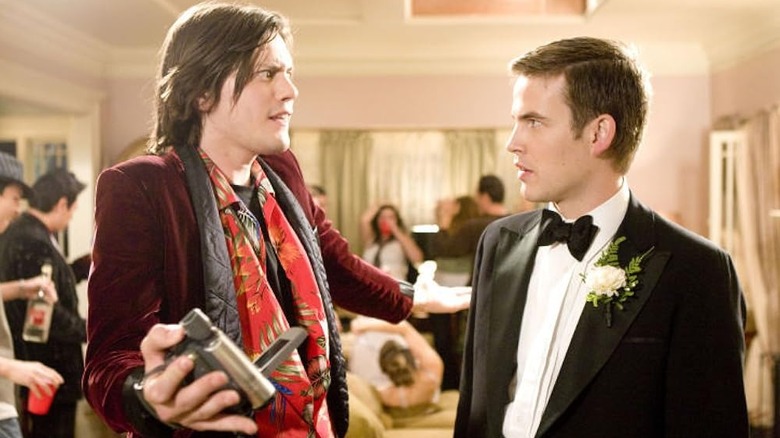 Tucker and Eugene looking at each other in 