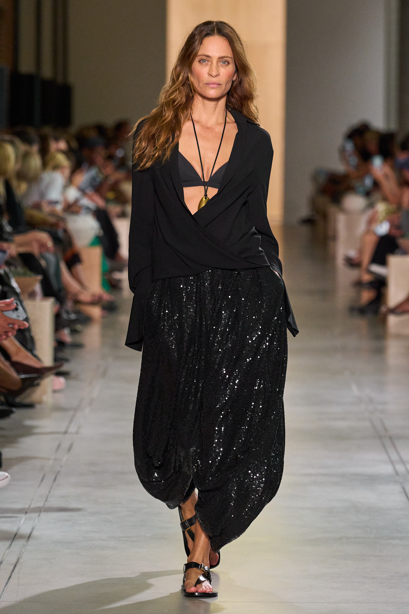 A Michael Kors model wearing sequin harem pants