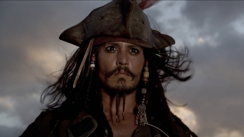 Johnny Depp sails the high seas as Captain Jack Sparrow in Pirates of the Caribbean: The Curse of the Black Pearl