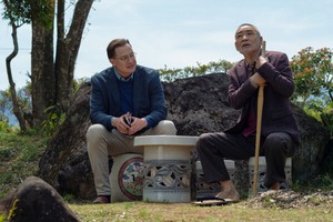 Brendan Fraser and Akira Emoto in RENTAL FAMILY