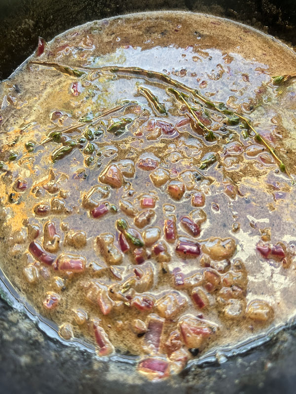 Try this Maple Bacon Cabbage recipe! Roasted cabbage wedges with crispy bacon and a homemade maple Dijon dressing. Easy, flavorful, gluten-free side dish for fall dinners, Thanksgiving, or meal prep. #vegetableside #cabbagerecipes #shutterbean