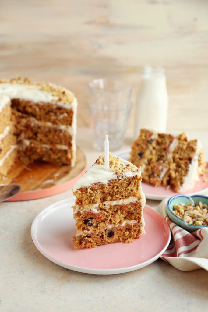 The Perfect Carrot Cake Recipe by Joy the Baker Huge slice of carrot cake on a plate.
