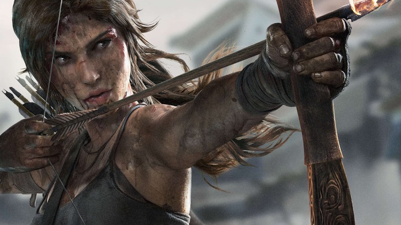 Lara aims an arrow in Tomb Raider (2013)